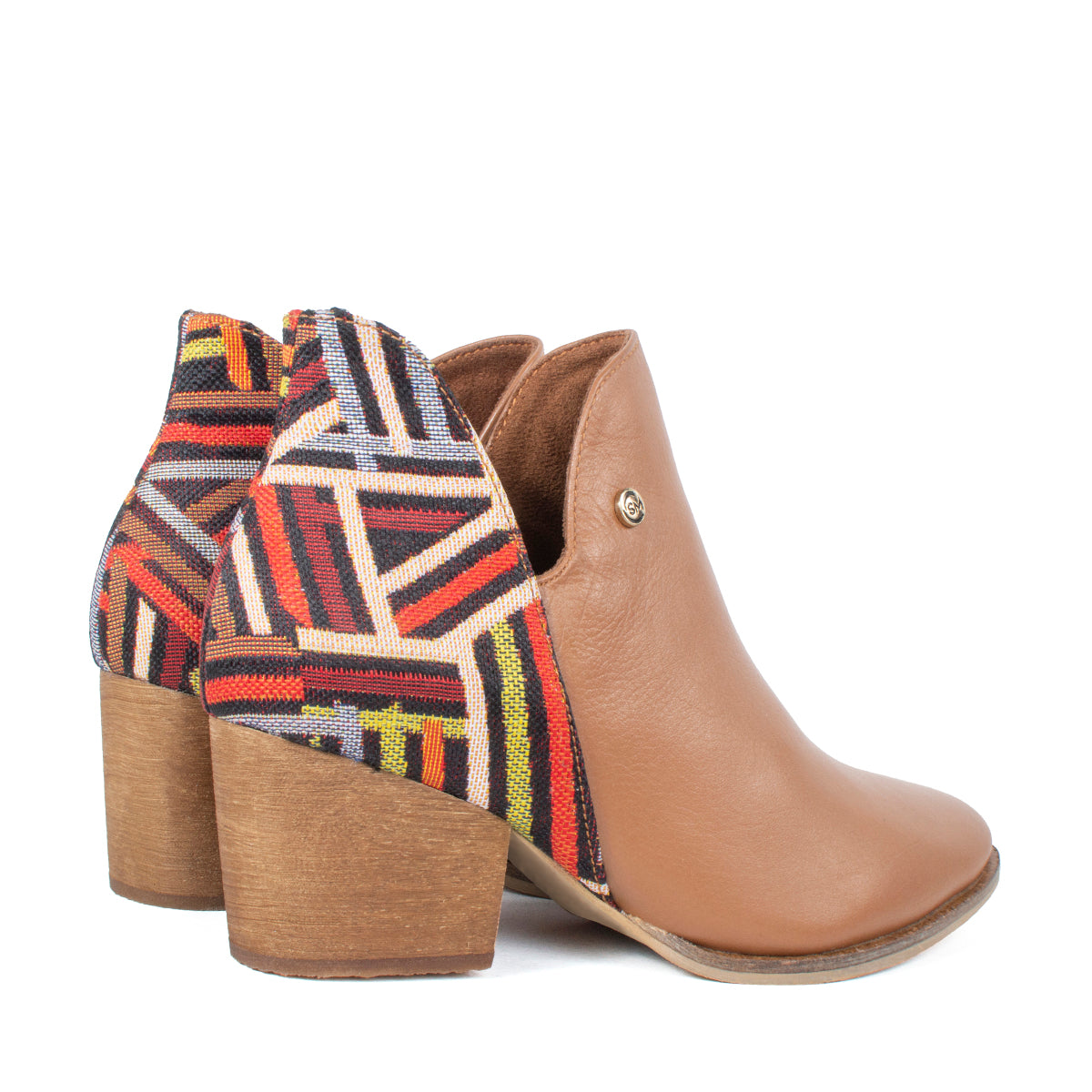 Botines texanos en cuero color miel con talón tejido