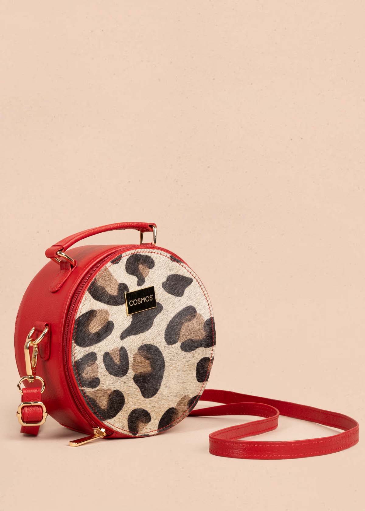 Bolso tipo bandolera en cuero color rojo y cuero con pelo animal print 105312