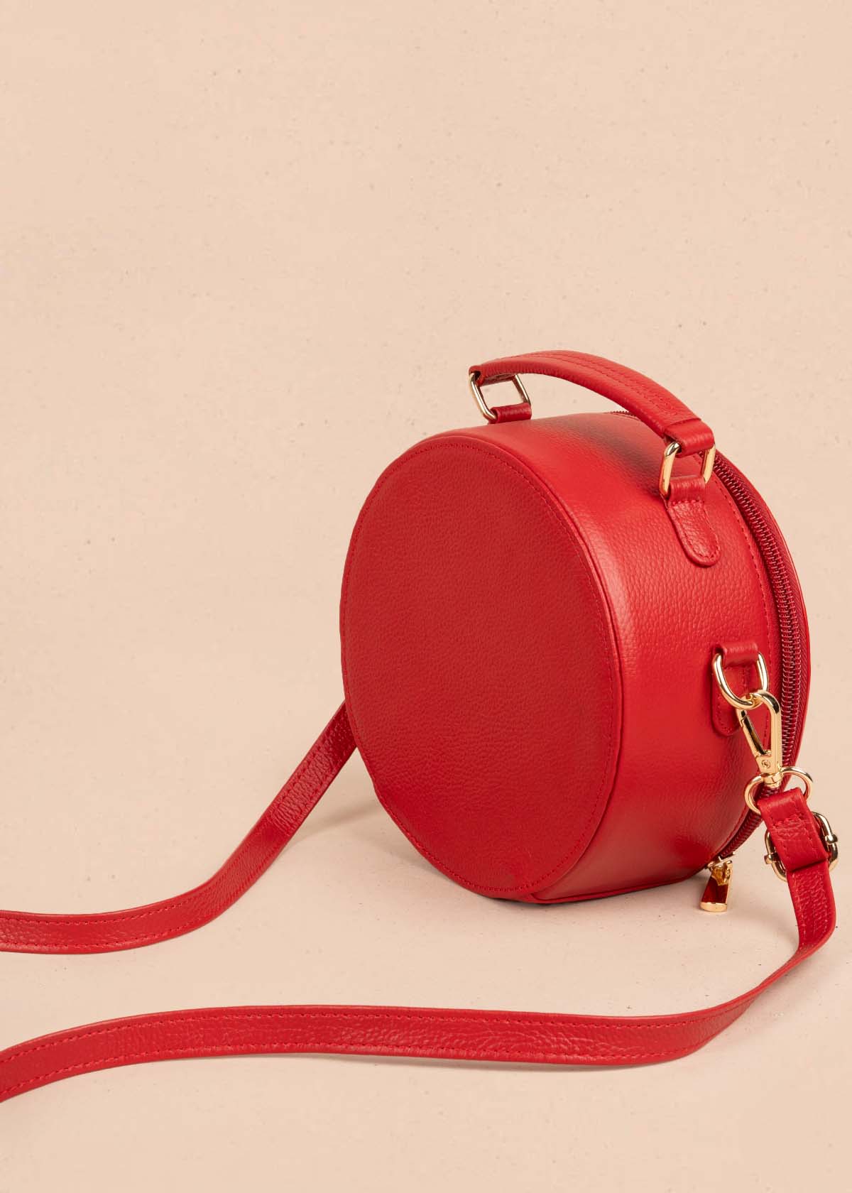 Bolso tipo bandolera en cuero color rojo y cuero con pelo animal print 105312
