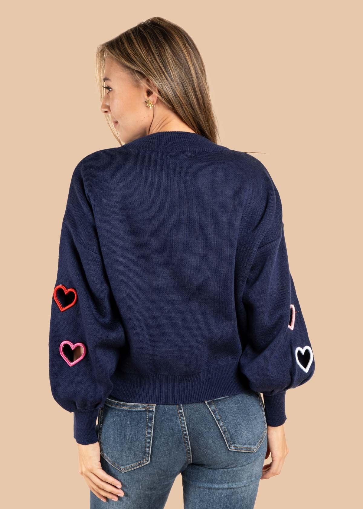 Buzo color azul con corazones 105525