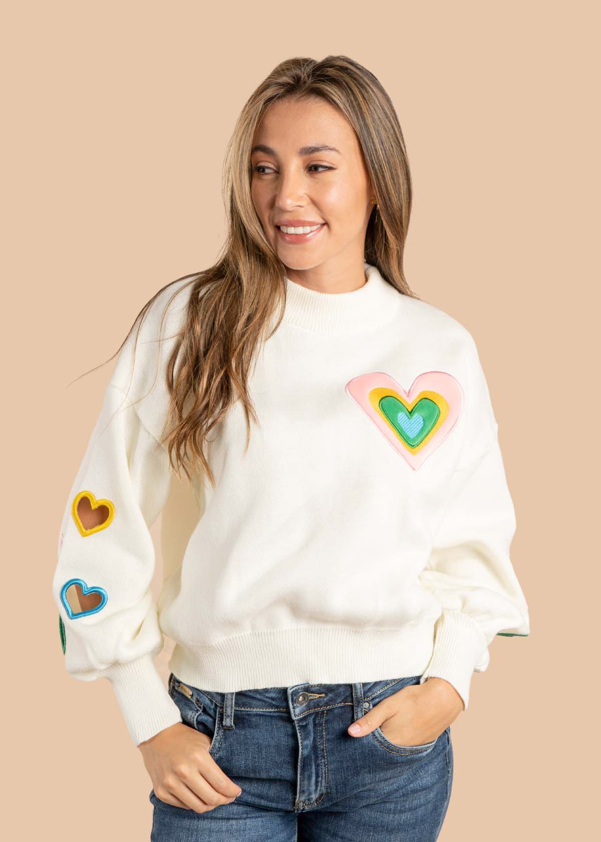 Buzo color crema con corazones 105525