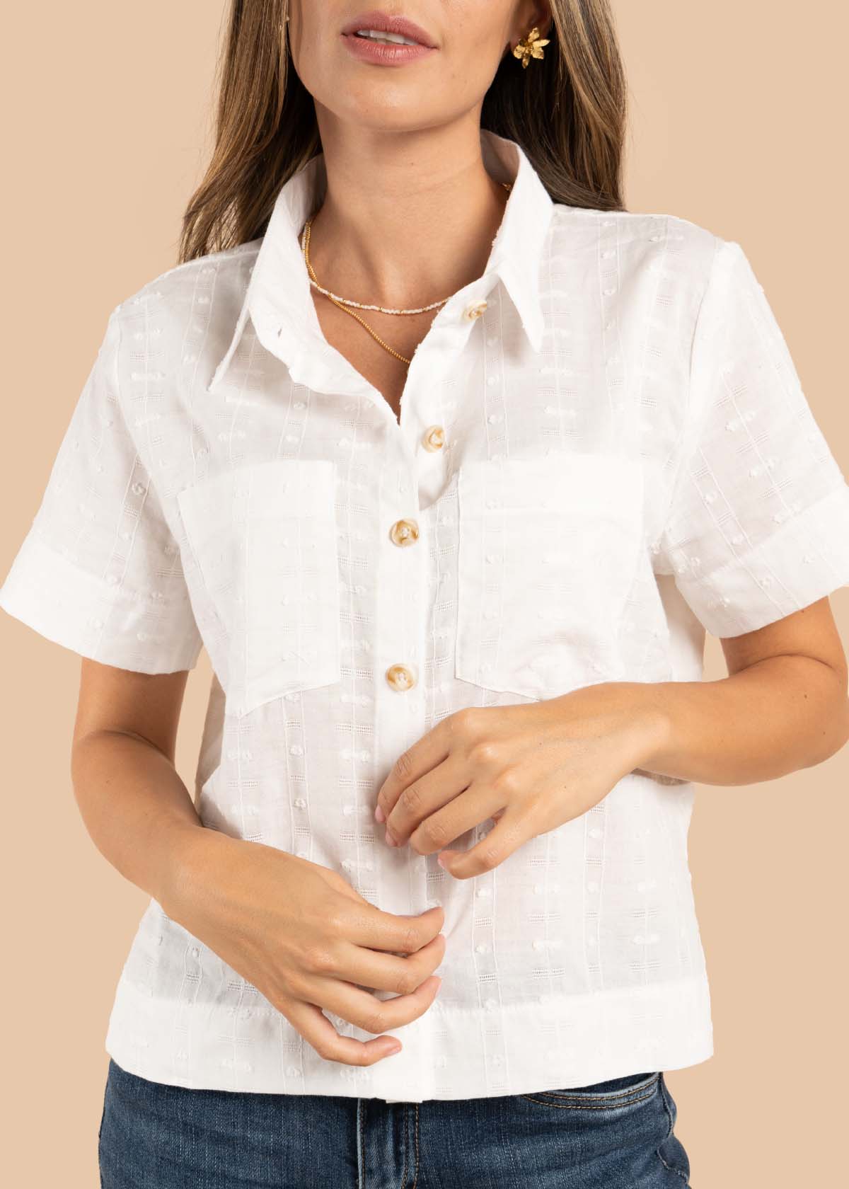 Blusa color marfil con bolsillos 105606