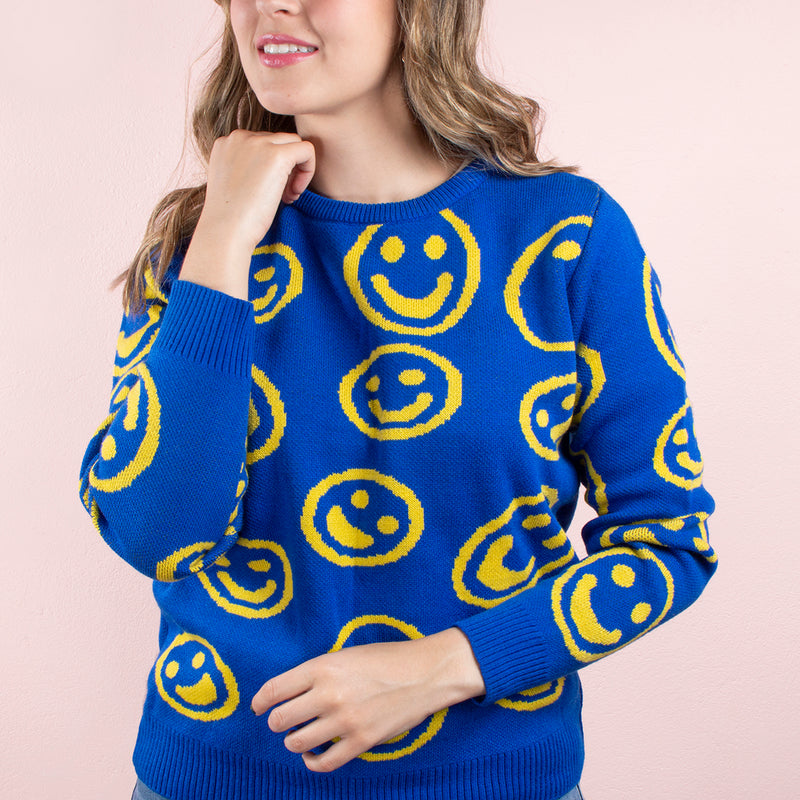 Buzo color azul tejido, fondo con emojis