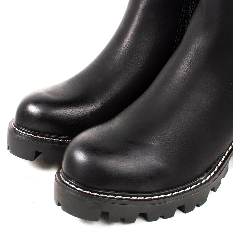 Botín estilo urbano color negro con cierre, para dama