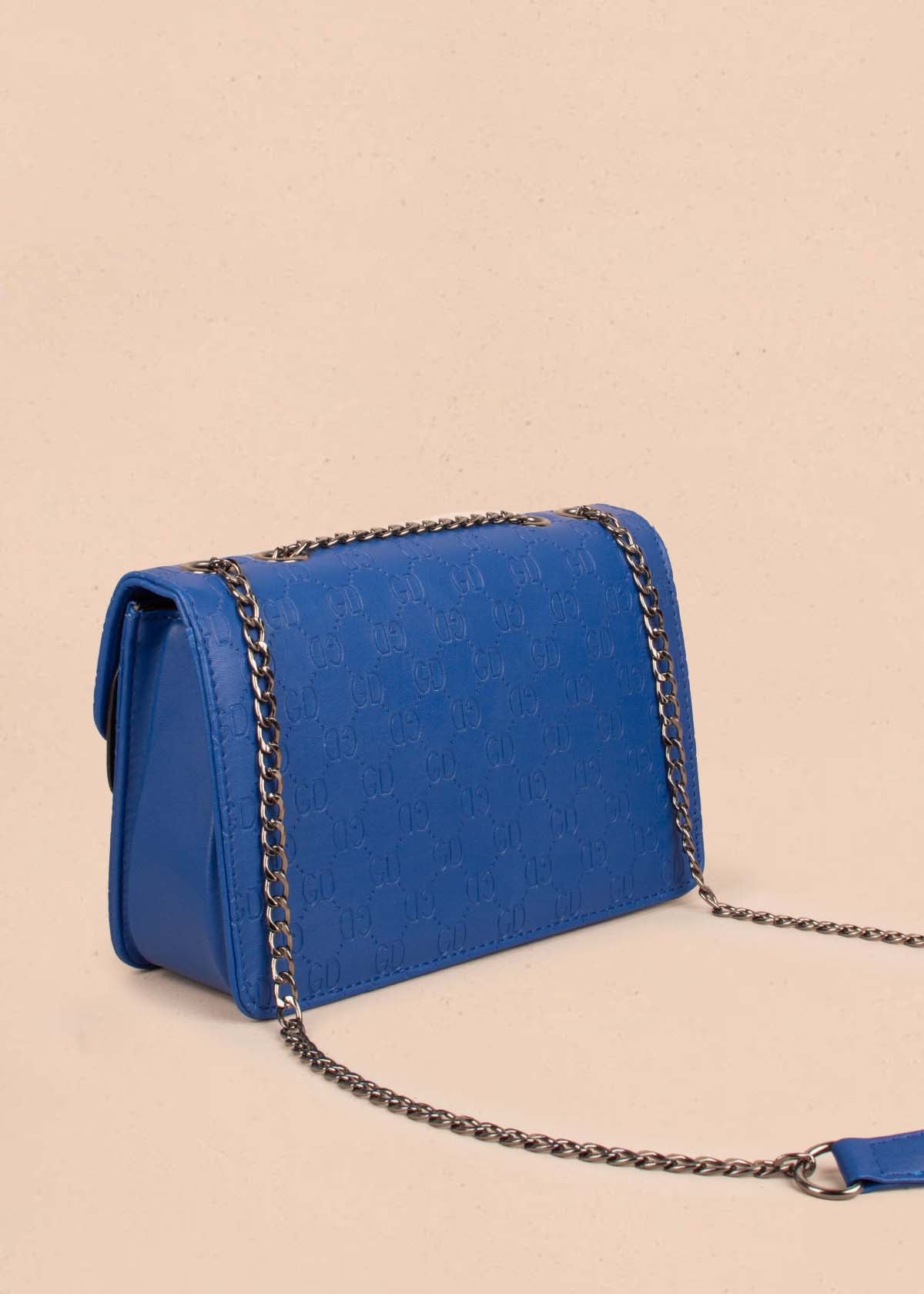 Bolso tipo bandolera color azul con herraje 102784