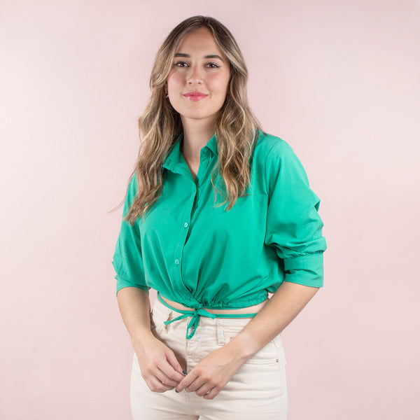 Blusa corta color verde con moño en abdomen