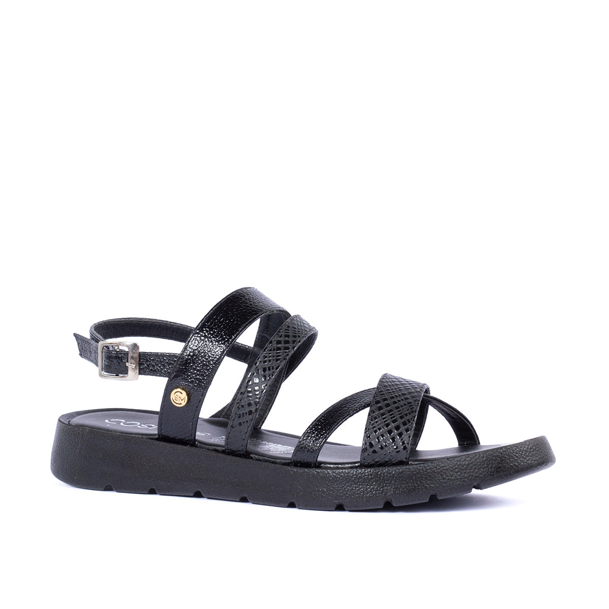 Sandalias planas color negro con acabado tipo pitón y con correas