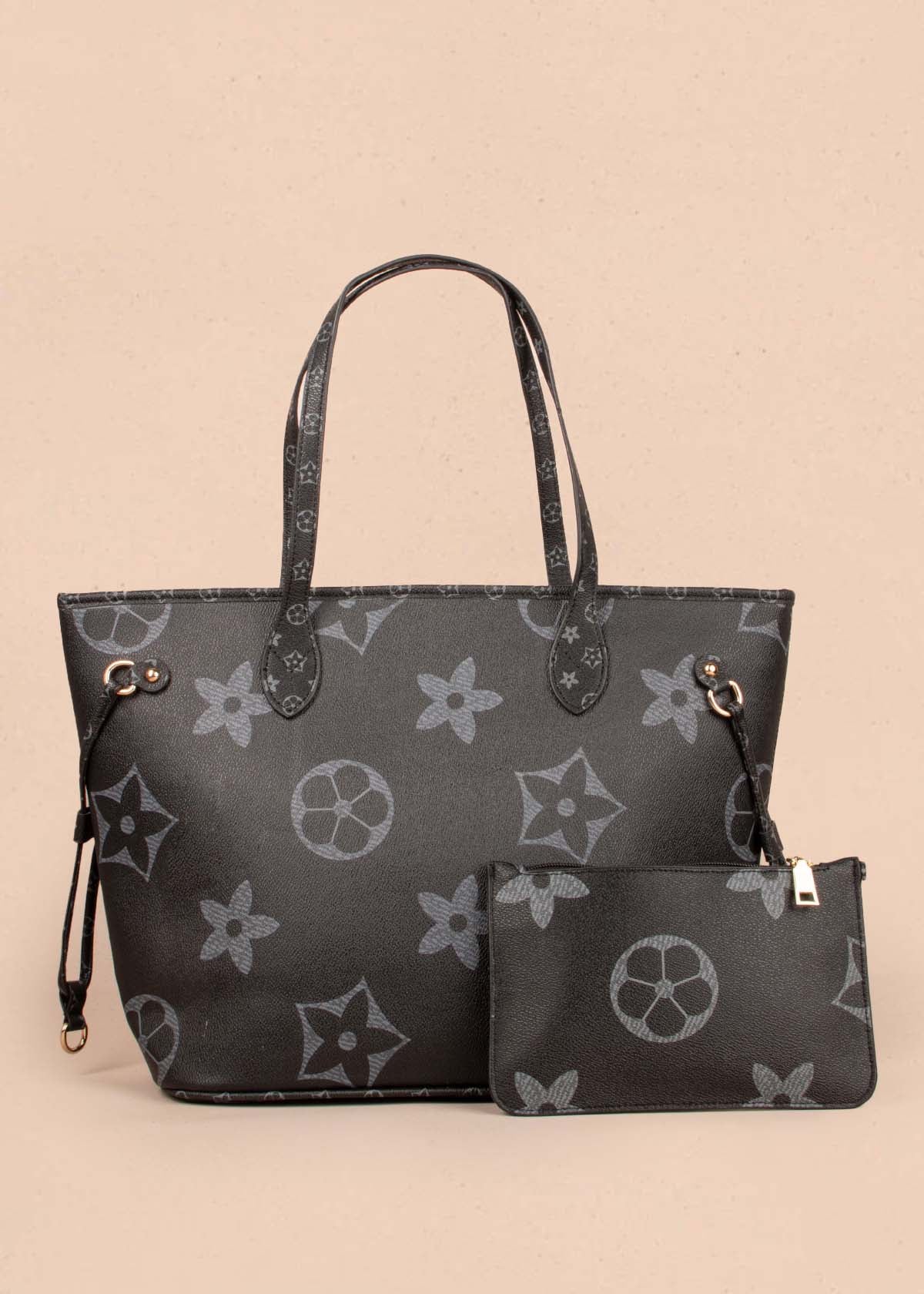 Bolso tipo shopping color negro con estampado de flores y cosmetiquera 104296