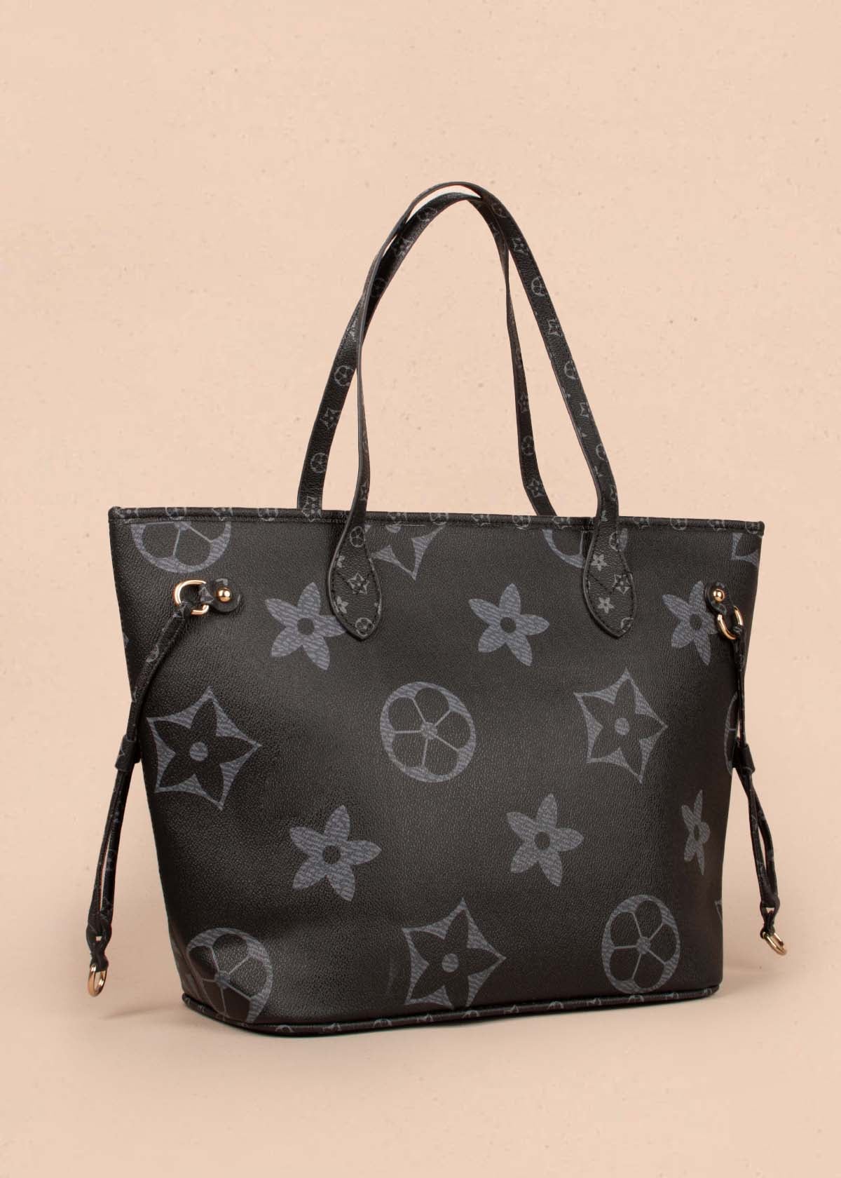 Bolso tipo shopping color negro con estampado de flores y cosmetiquera 104296