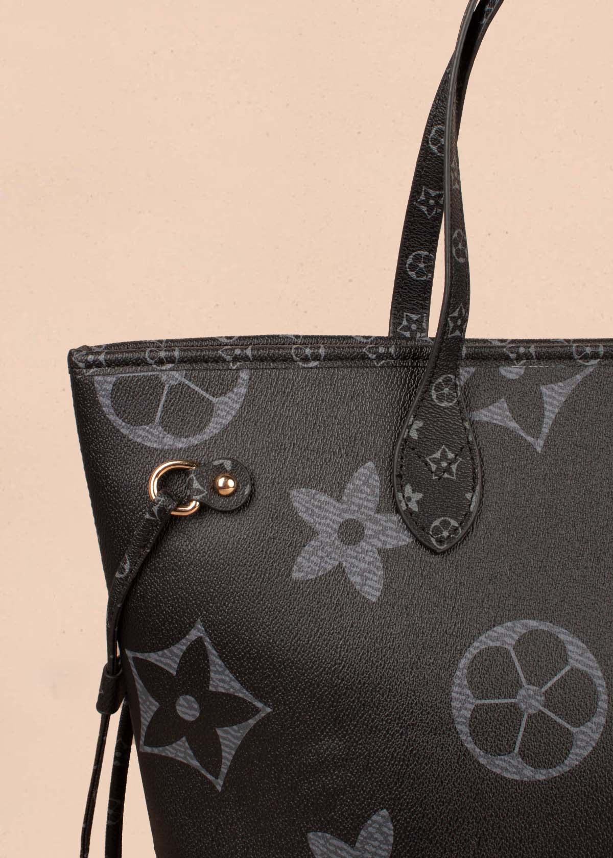 Bolso tipo shopping color negro con estampado de flores y cosmetiquera 104296