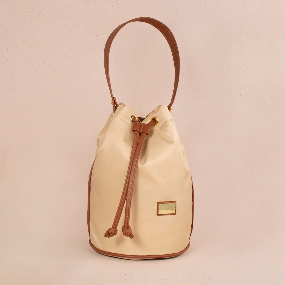 Bolso tipo tula color beige 104380