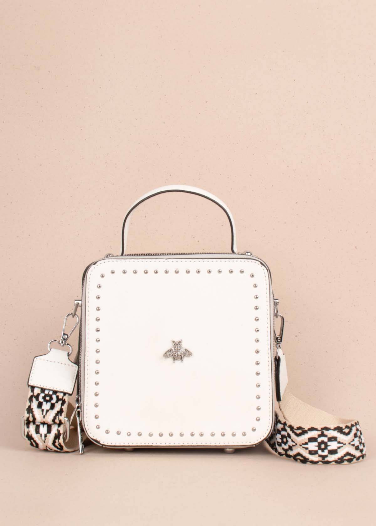 Bolso tipo bandolera color blanco con taches 104389