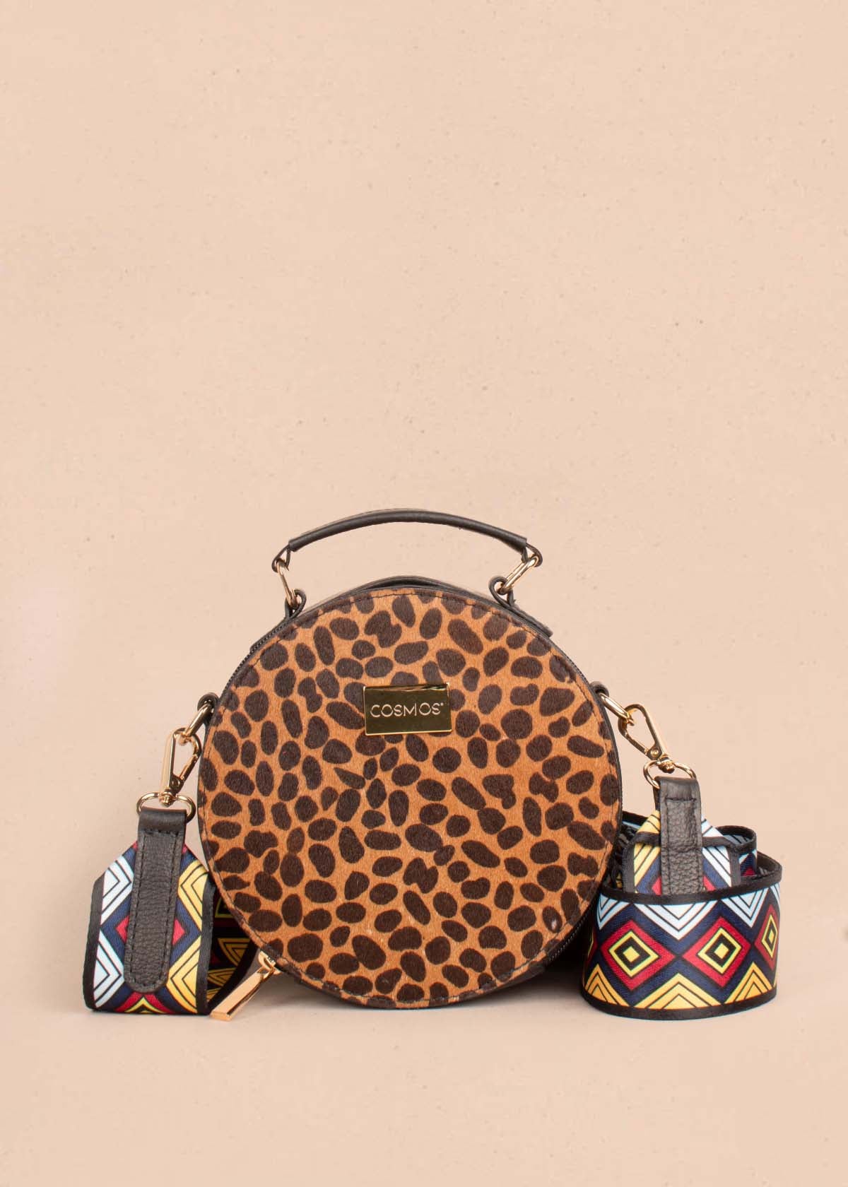 Bolso tipo bandolera en cuero color negro y cuero con pelo animal print 104518