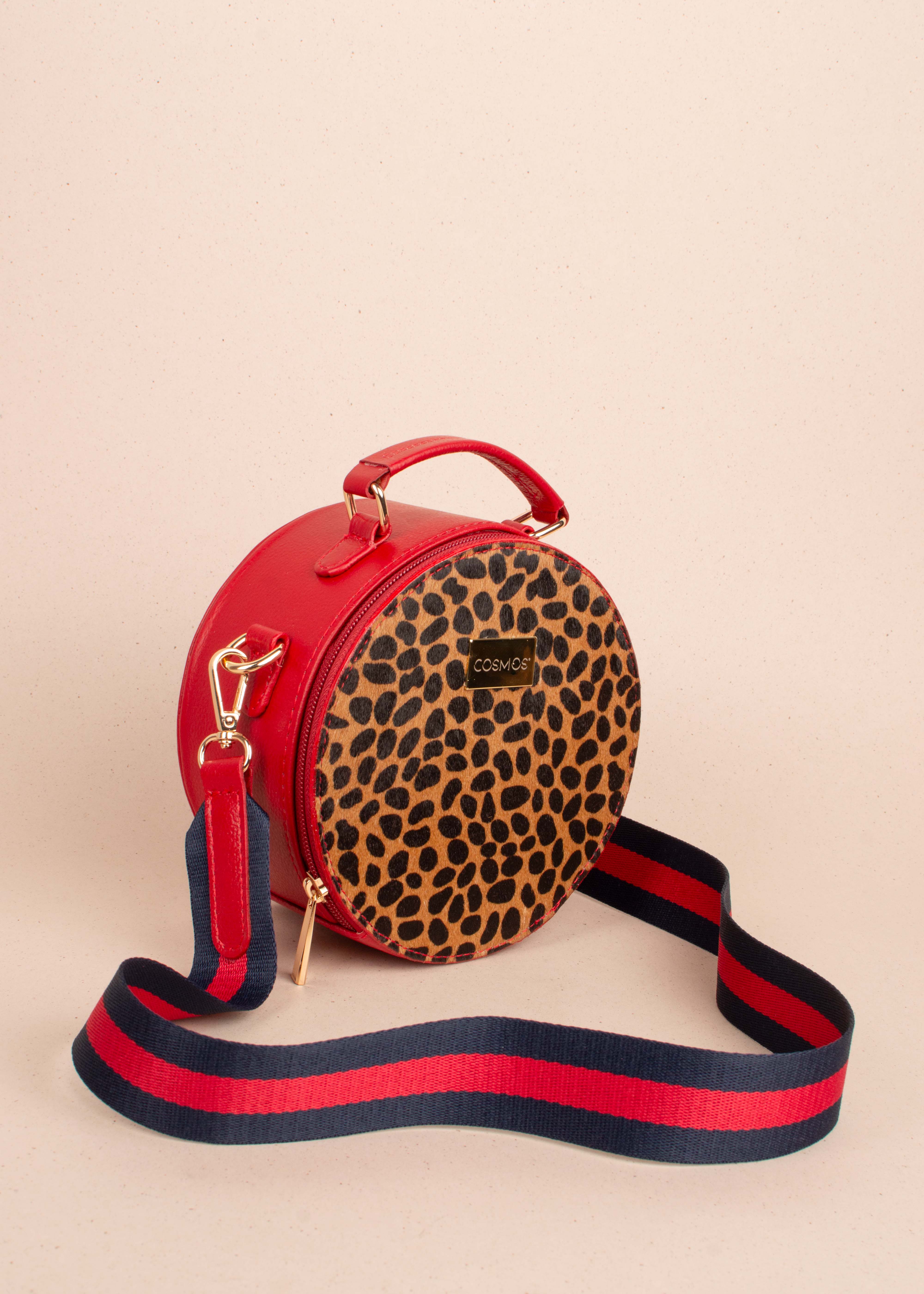 Bolso tipo bandolera en cuero color rojo y cuero con pelo animal print 104518