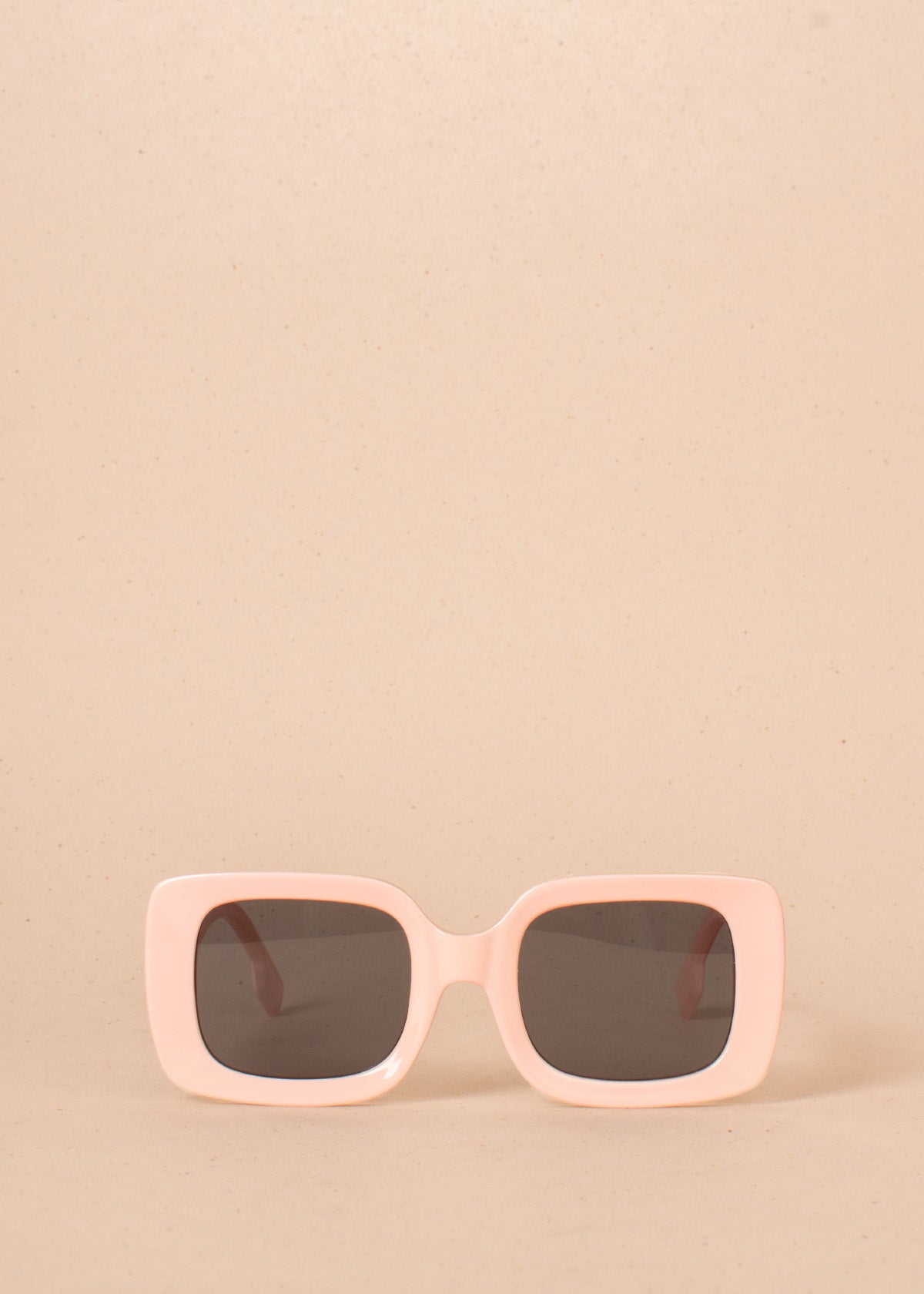 Gafas de sol color rosado con marco rectangular 104523