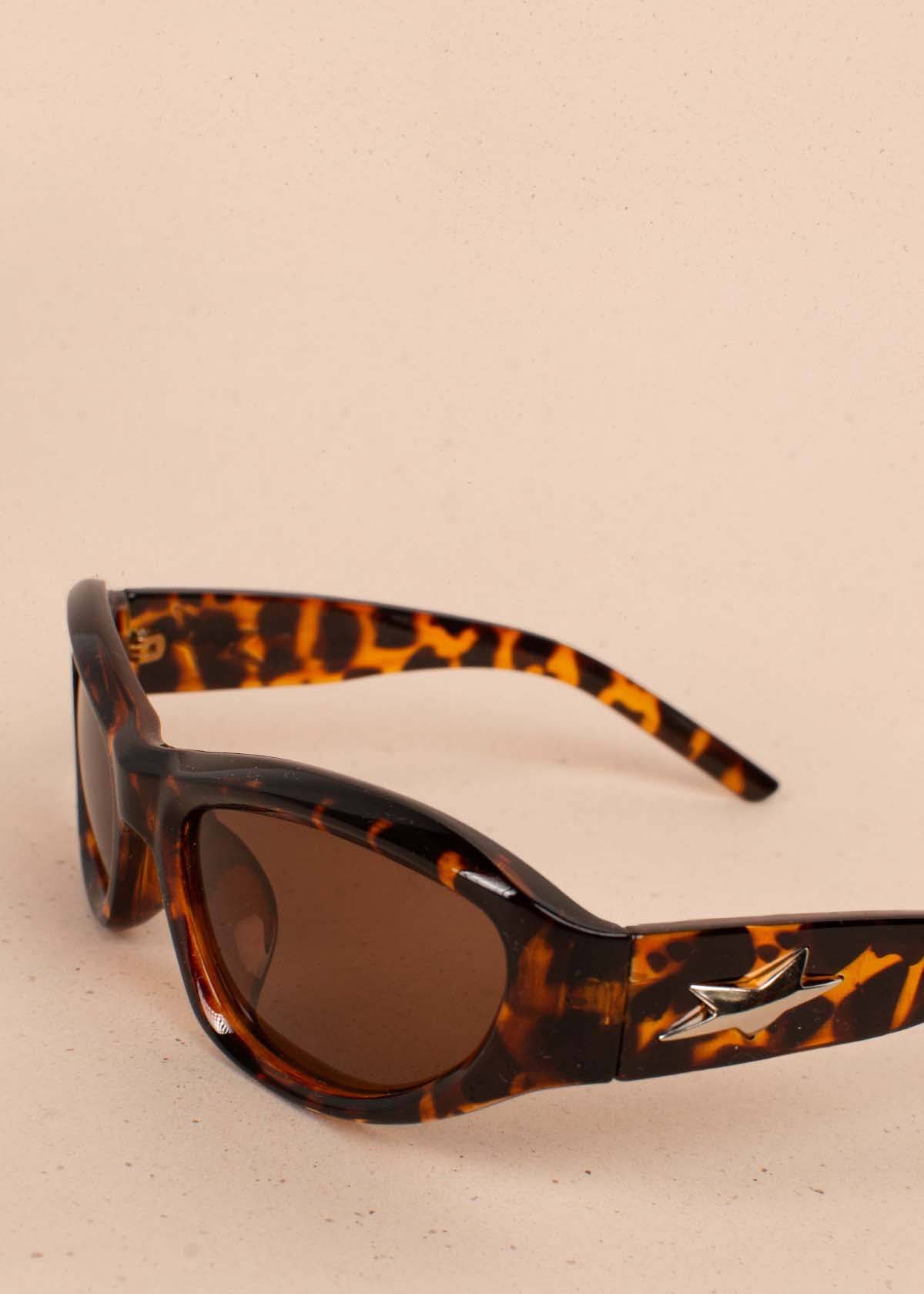 Gafas de sol color animal print con marco ojos de gato 104526