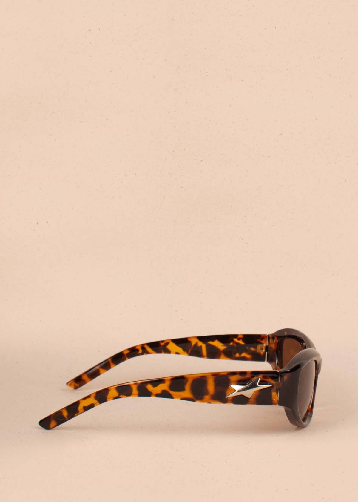 Gafas de sol color animal print con marco ojos de gato 104526