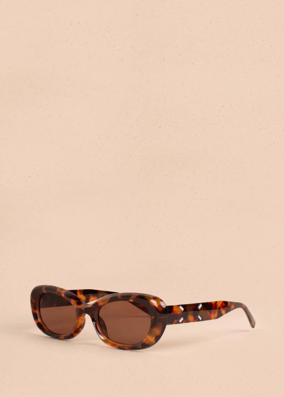 Gafas de sol color animal print con marco ovalado 104530