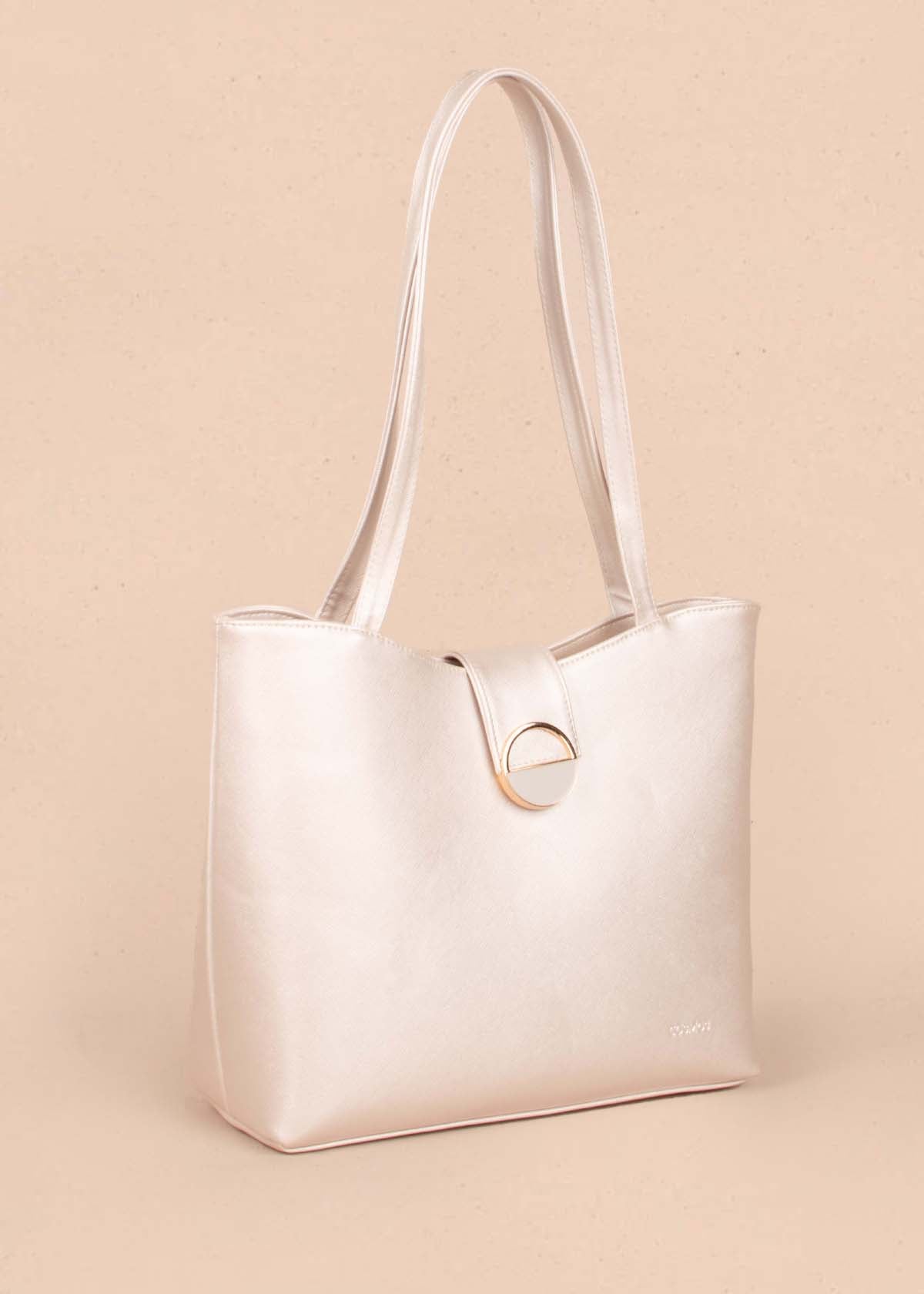 Bolso tipo shopping color beige con herraje 104816