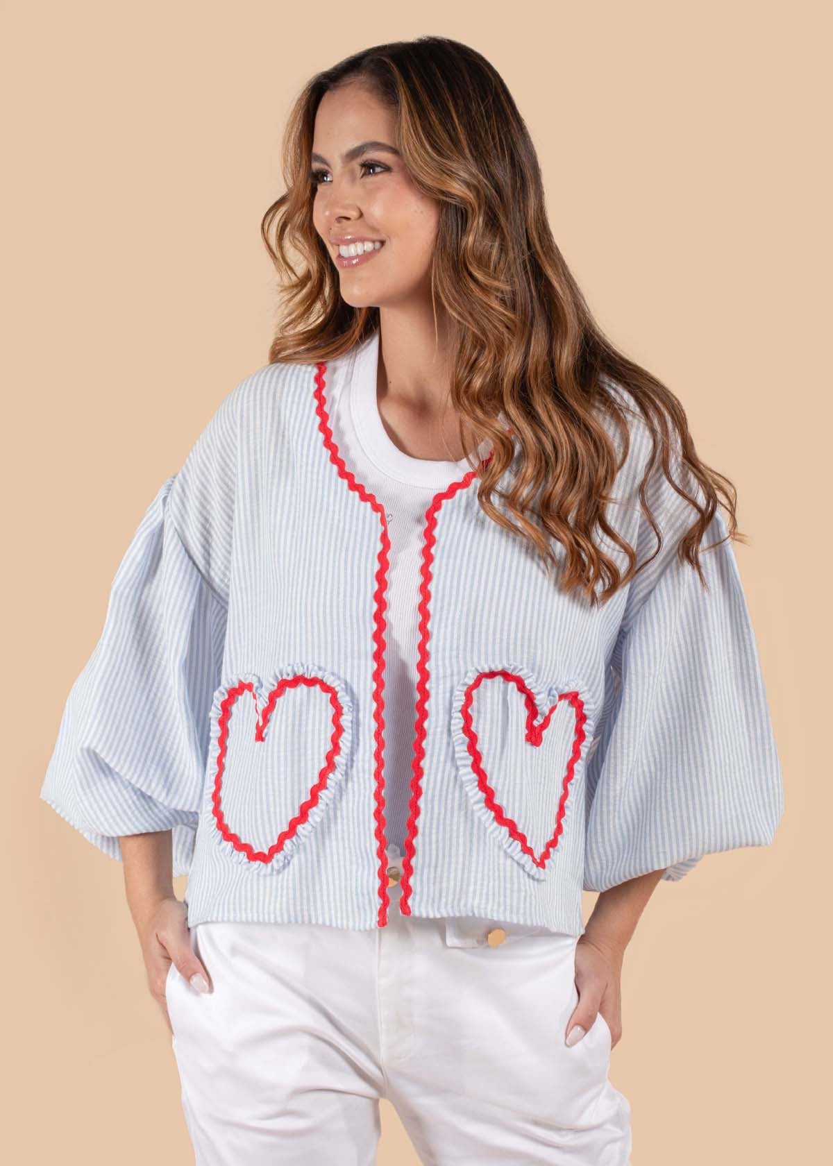 Blusa color azul claro con corazón 105072