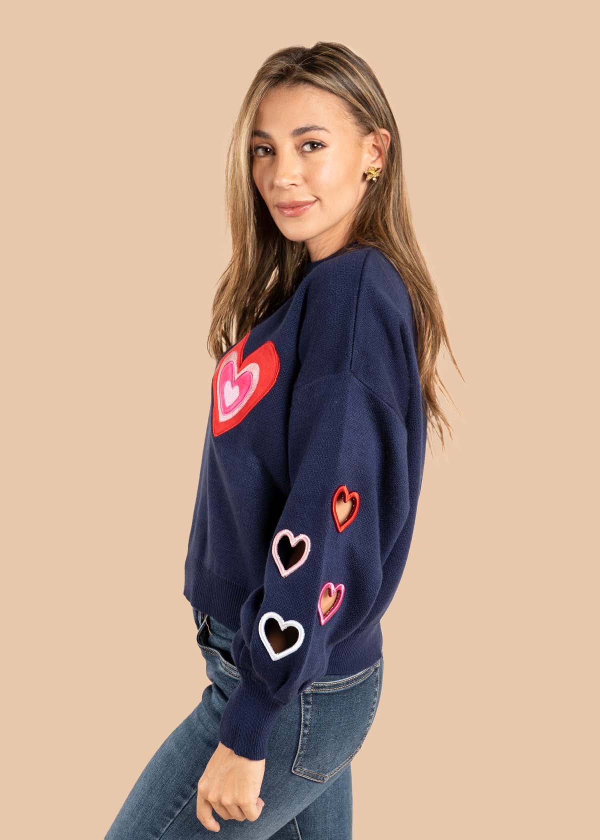 Buzo color azul con corazones 105525