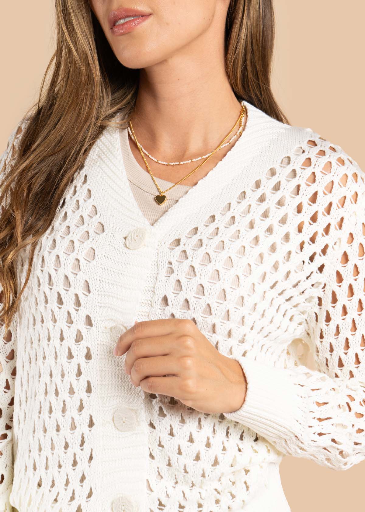 Sweater tejido en malla color crema 105648