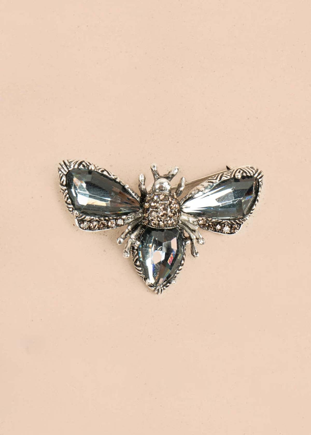 Prendedor de polilla color gris 105679
