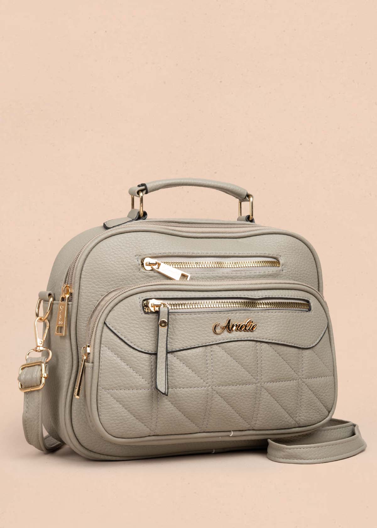 Bolso manos libres color gris con bolsillo frontal 105755