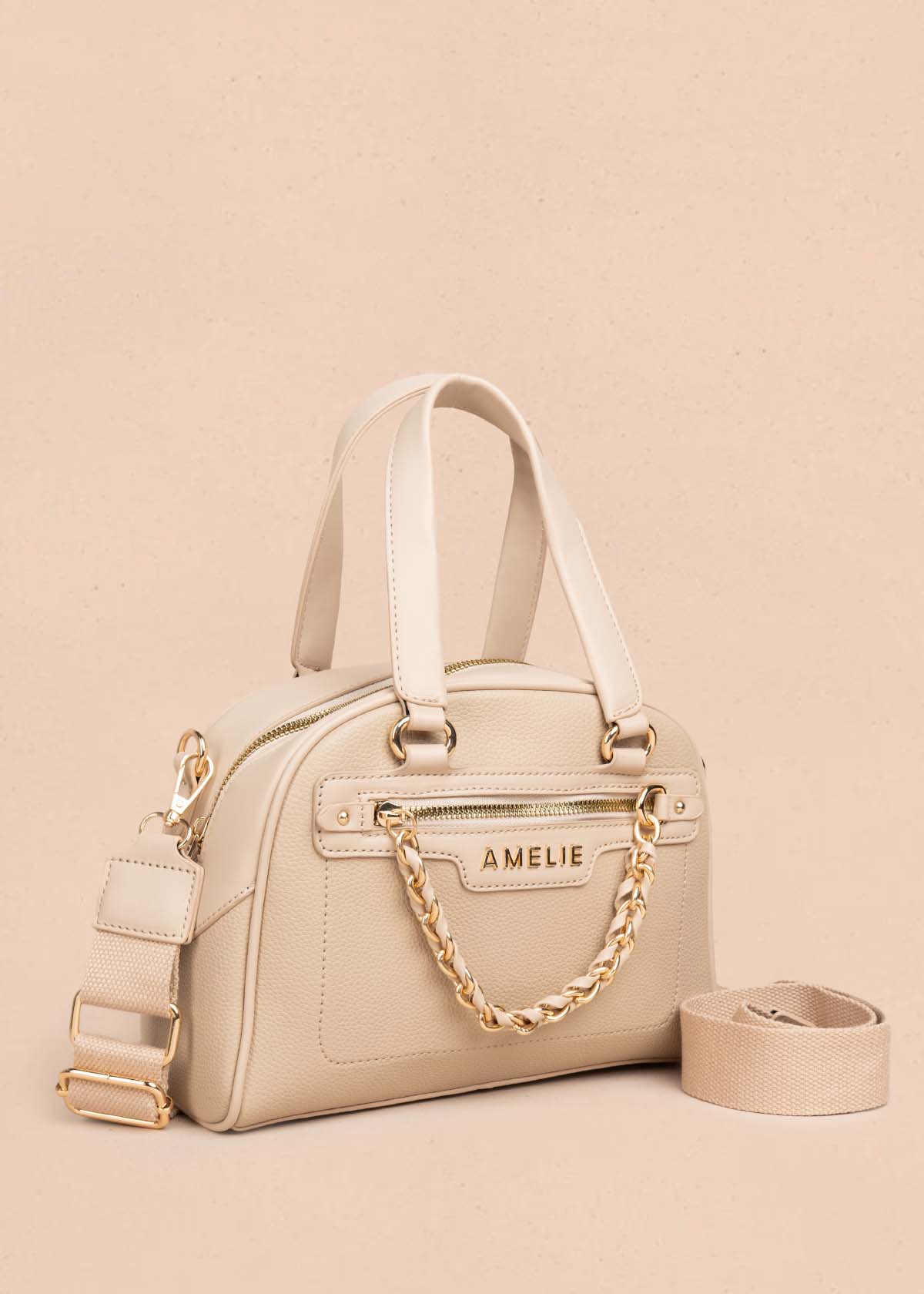 Bolso manos libres color arena con cadena en cierre 105771