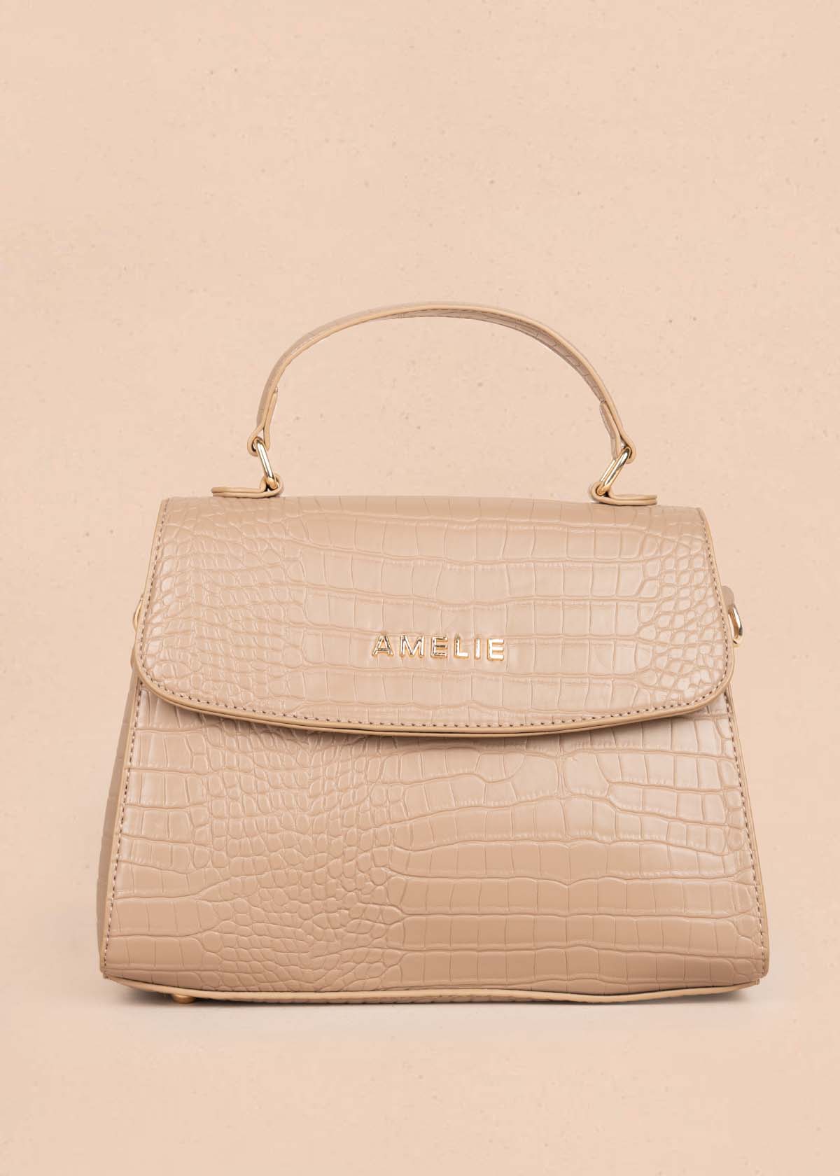 Bolso manos libres color taupe con textura croco 105772