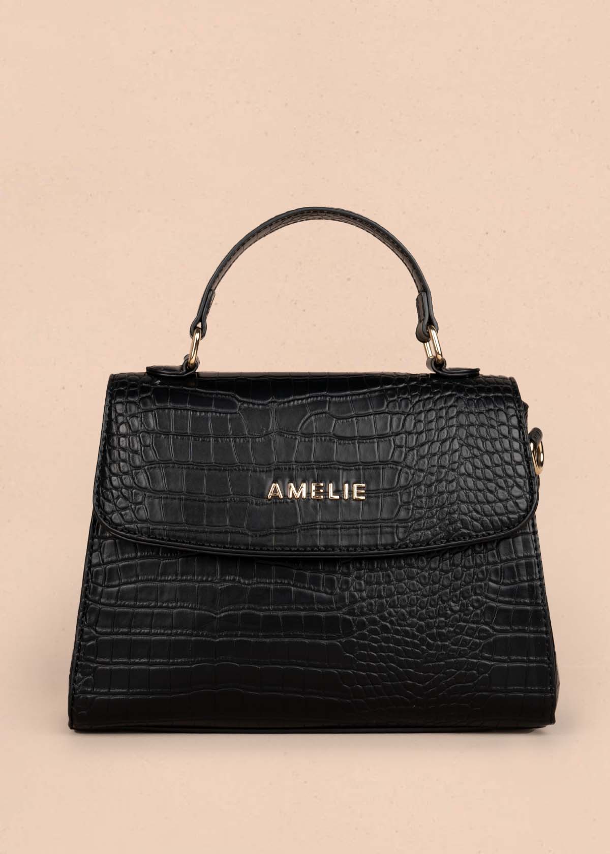 Bolso manos libres color negro con textura croco 105772