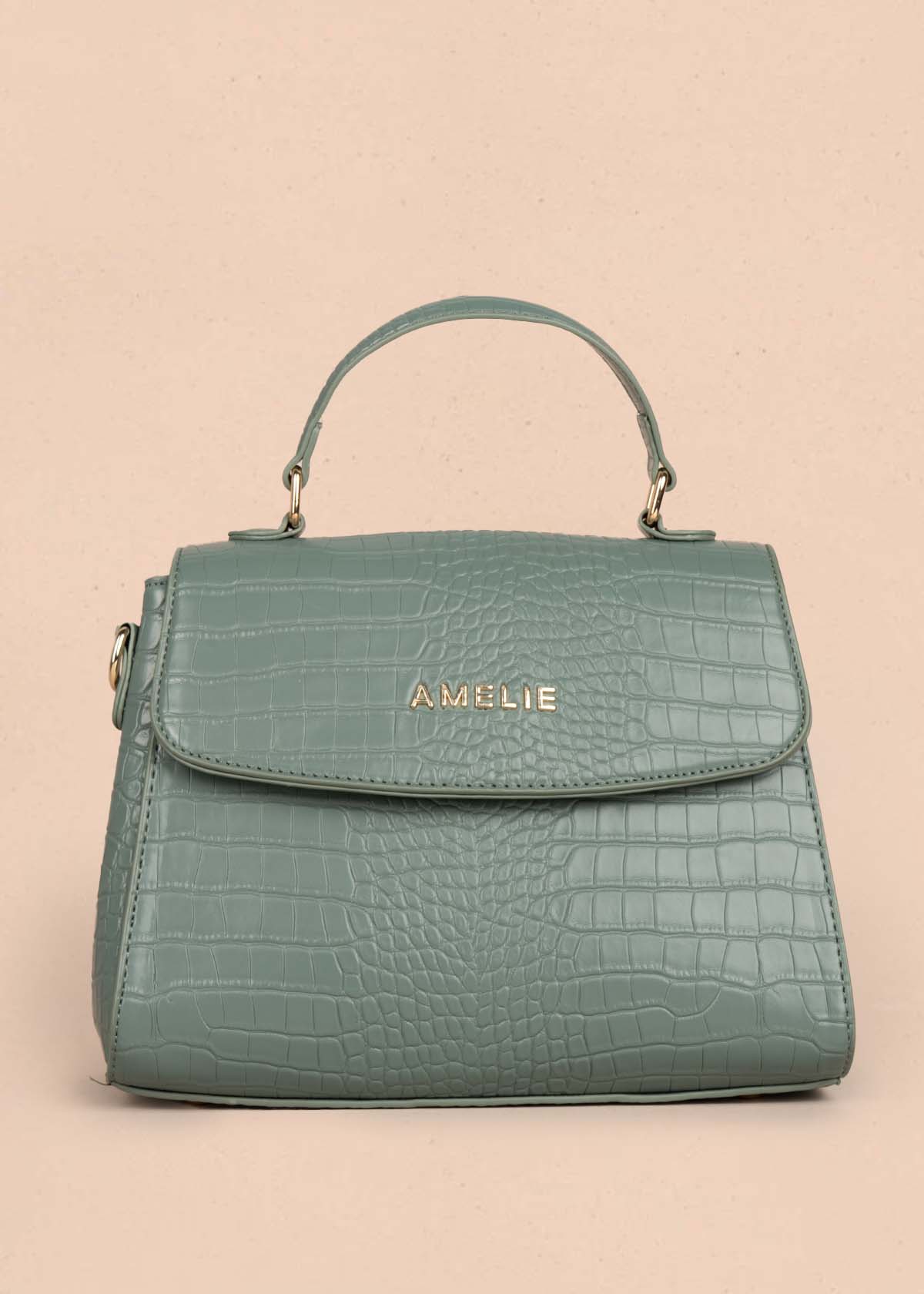 Bolso manos libres color verde con textura croco 105772