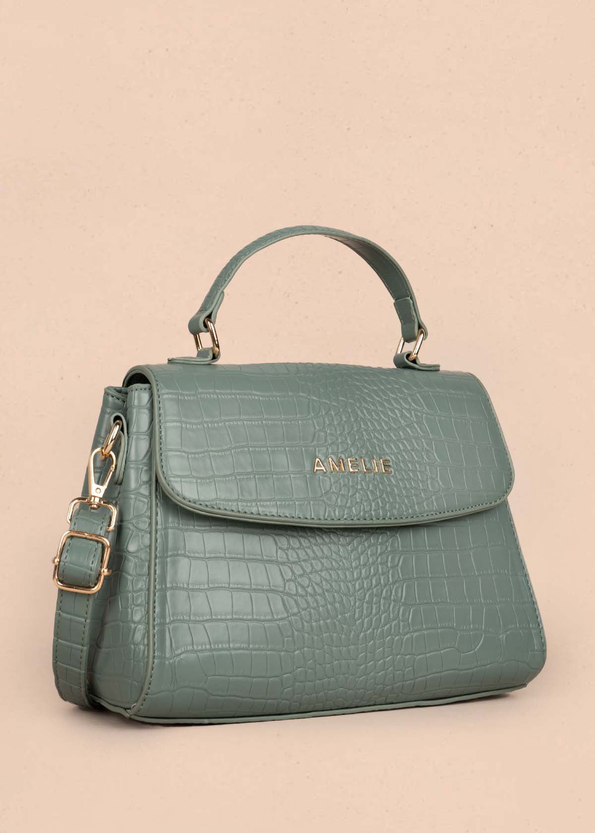 Bolso manos libres color verde con textura croco 105772