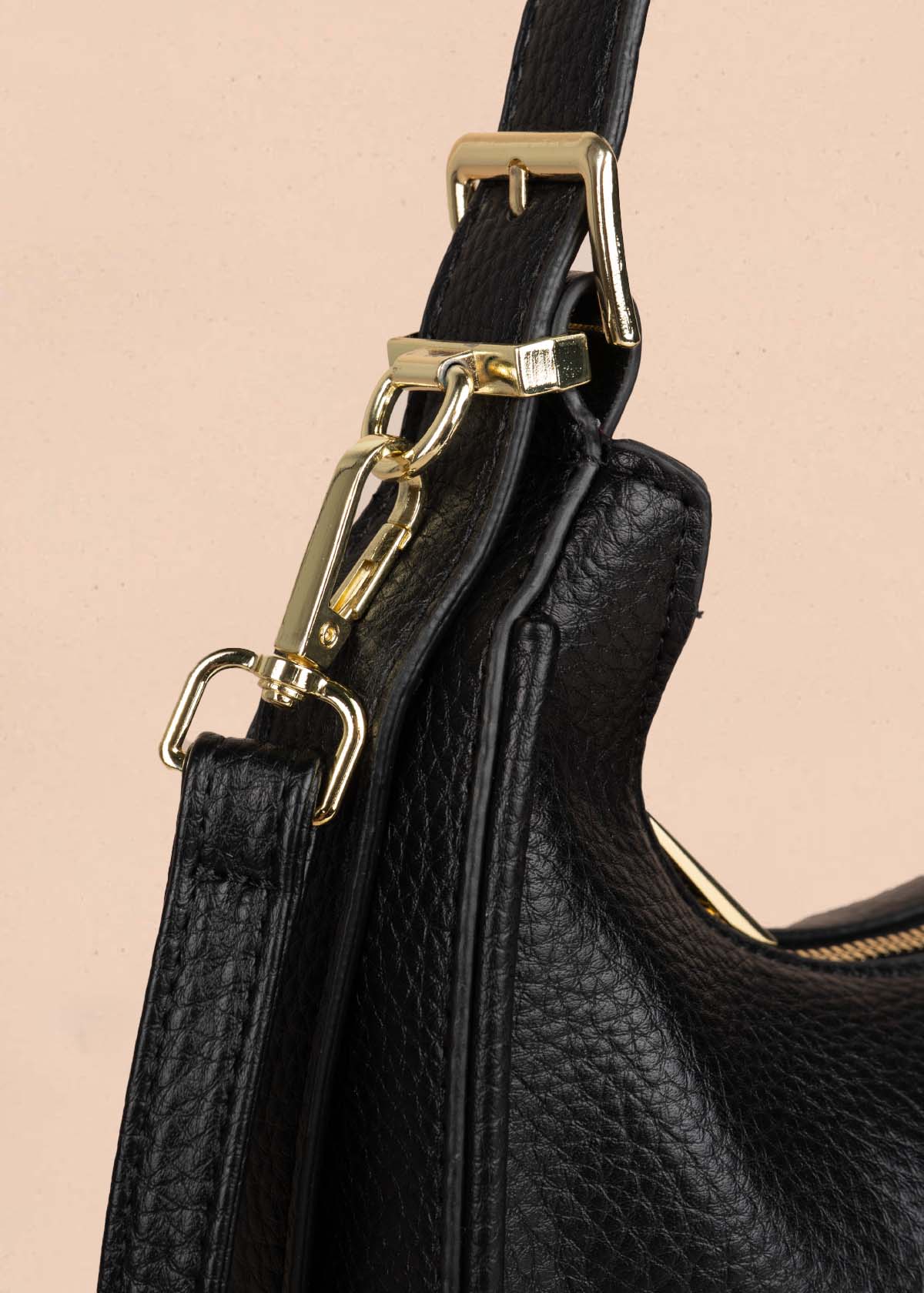 Bolso tipo cartera color negro 105773