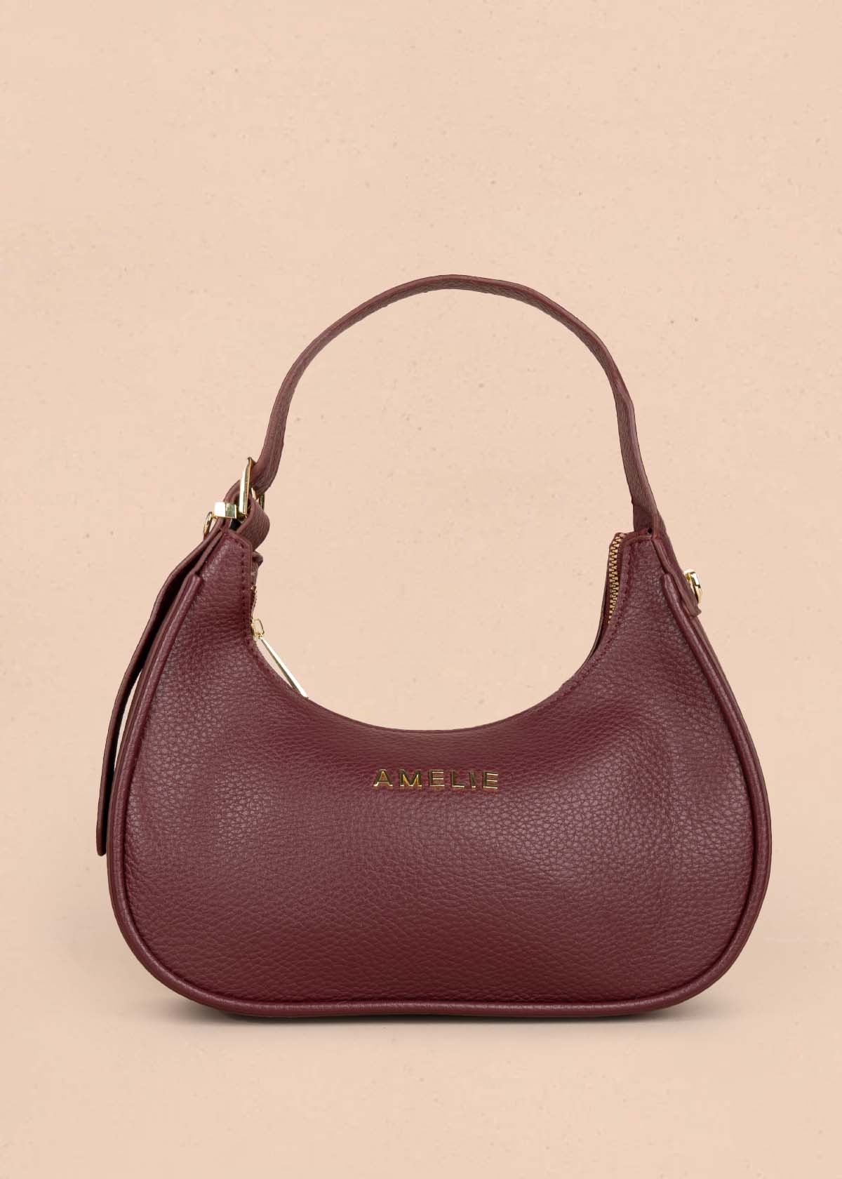 Bolso tipo cartera color vinotinto 105773