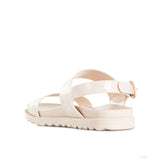 Sandalias color crema, estilo en plástico con hebilla de mujer