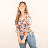 Blusa color azul claro con detalle de flores, para dama