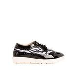 Atadura color negro con detalle de animal print, para dama