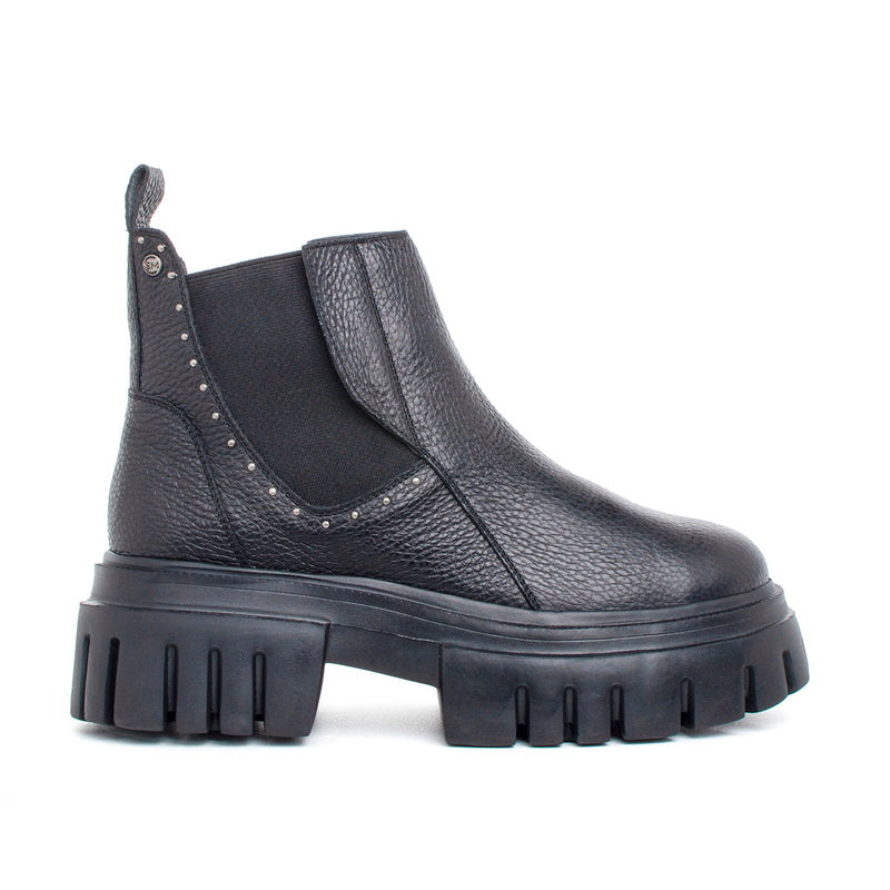 Botin suela tractorada color negro, para dama