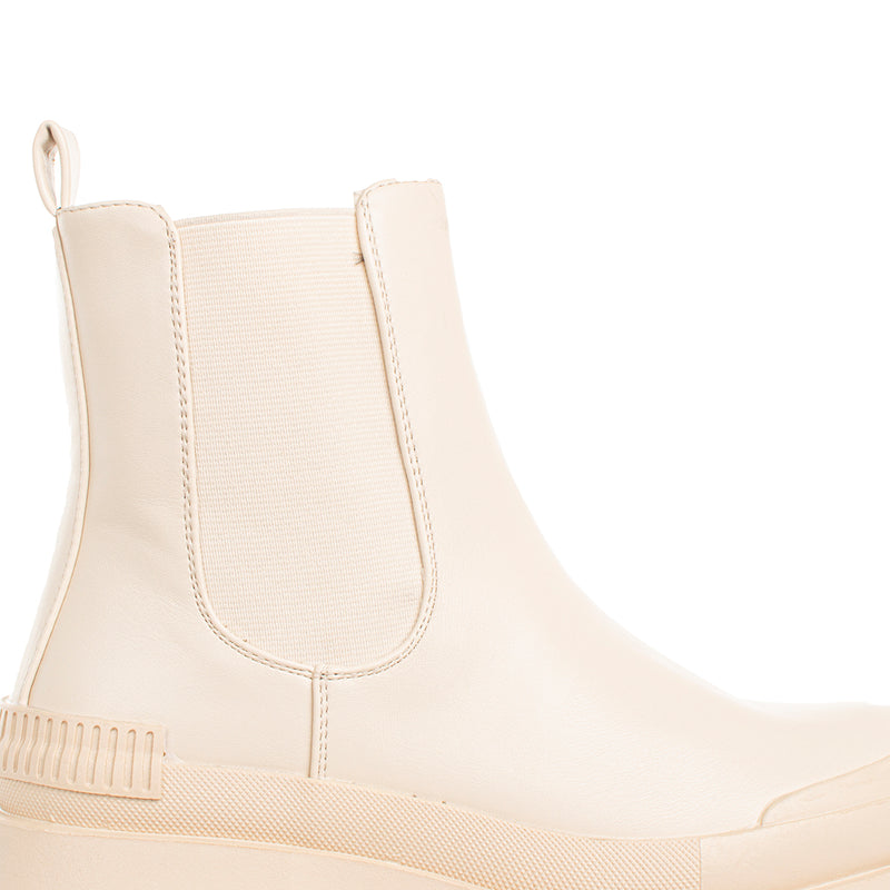 Botin sintetico color beige, para dama